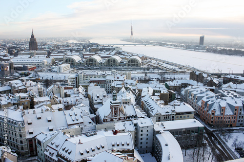 Riga Cathedral aerial top view with Riga Castle and Daugava River in the background in the winter in Riga old town 