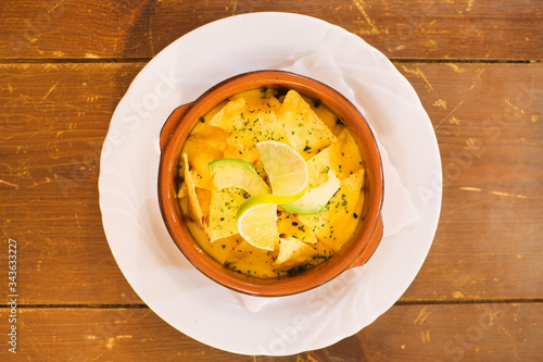 tortilla bowl with cheese and lime