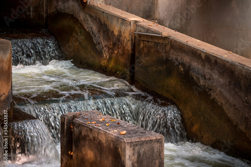 water fall steps at the fish ladder in downtown Grand Rapids Michigan
