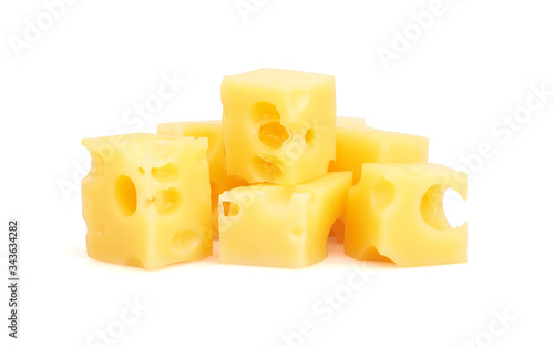 Many pieceses of cheese on white