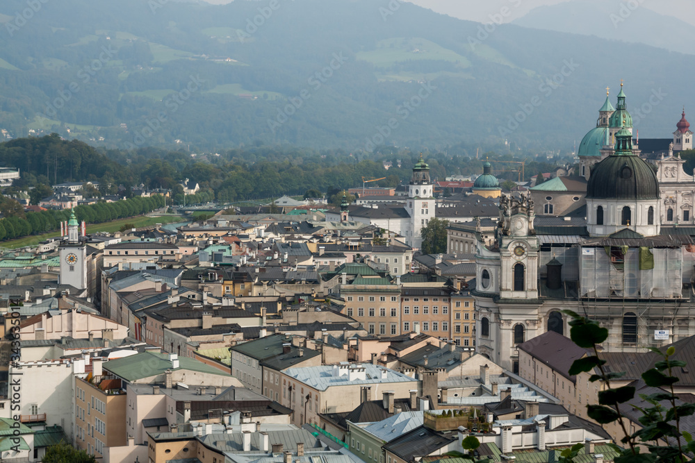 Salzburg top view from above on  Salzach river aerial panoramic  at a historic city center with cathedrals in Austria, Europe 