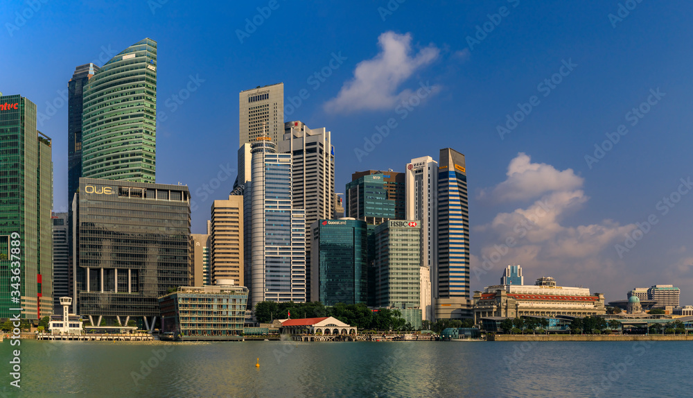 Fototapeta premium Skyscapers of the Singapore city business district skyline at Marina Bay of downtown in daytime