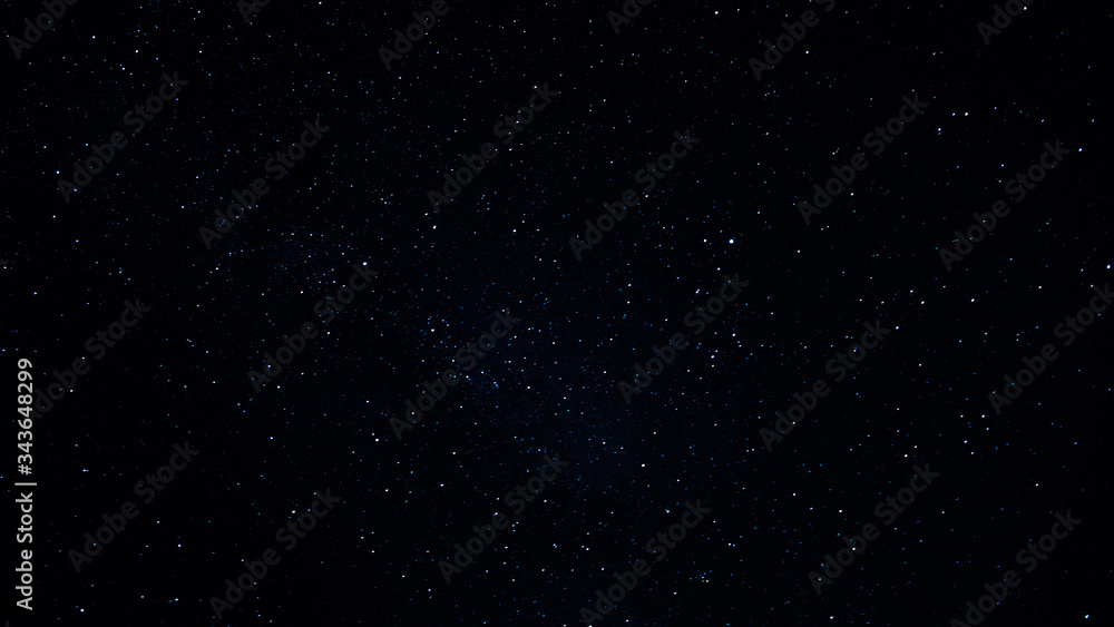 Black night sky filled with countless stars in outer space background