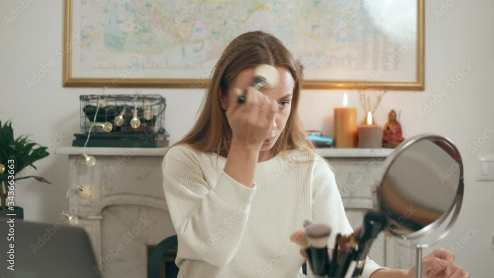 Woman Beauty Vlogger. Home isolation during coronavirus quarantine, girl make Video Clip by Smartphone Sharing on Social Media. Fashion Blogger Live Cosmetic Makeup Tutorial. Woman Beauty Vlogger. Home isolation during coronavirus quarantine, girl make Video Clip by Smartphone Sharing on Social Media. Fashion Blogger Live Cosmetic Makeup Tutorial.