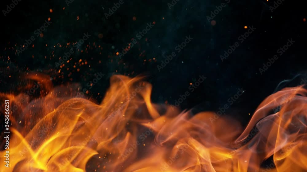 Fire flames with sparkles shooting on high speed camera at 1000fps, Isolated on black background. Fire flames with sparkles shooting on high speed camera at 1000fps, Isolated on black background.