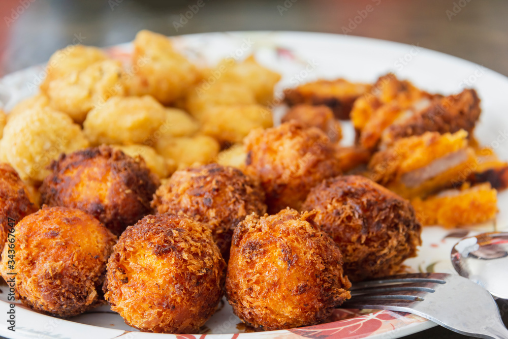 delicious cheese ball fried with chicken nugget on white disc ready eat delicious cheese ball fried with chicken nugget on white disc ready eat