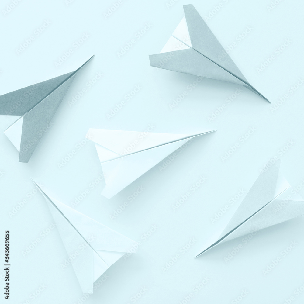 Paper planes on pastel background Paper planes on pastel background
