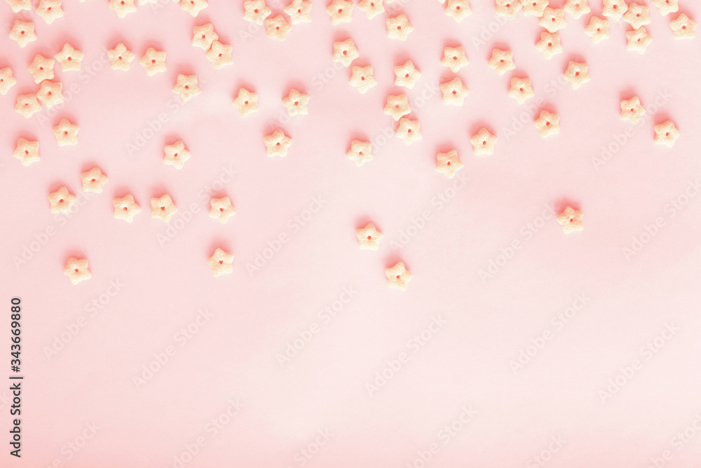 Cereal star shapes on pastel background