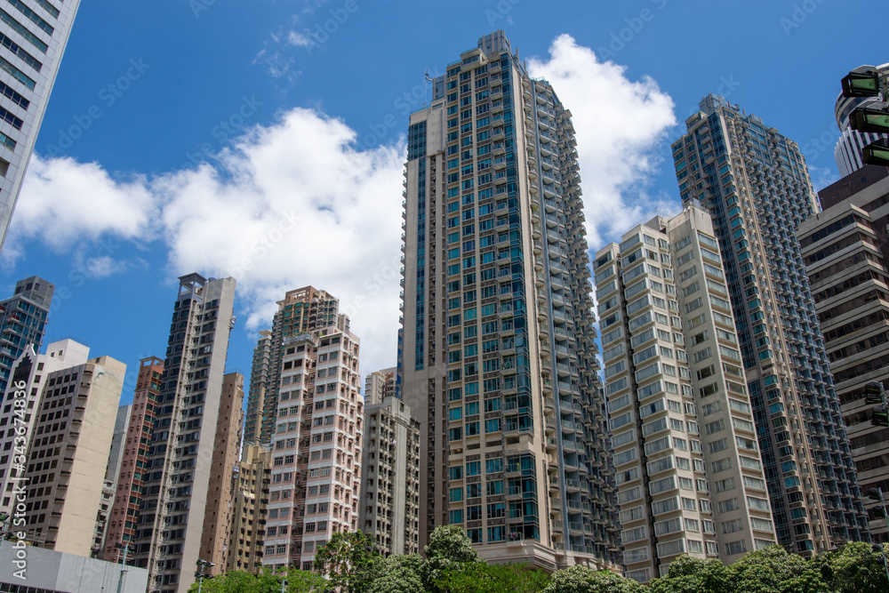 High rise buildings in Hong Kong, China during Clear Sunny Weather High rise buildings in Hong Kong, China during Clear Sunny Weather