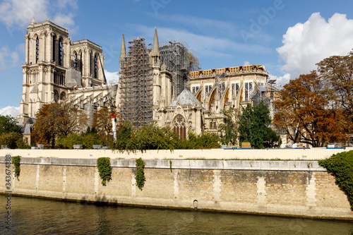 Notre Dame Cathedral in Paris, France, after the fire, under reconstruction with scaffolding