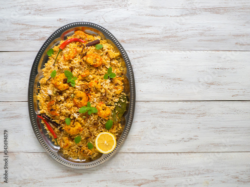 Pilaf with shrimp. Tasty and delicious prawns biryani, top view, copy space