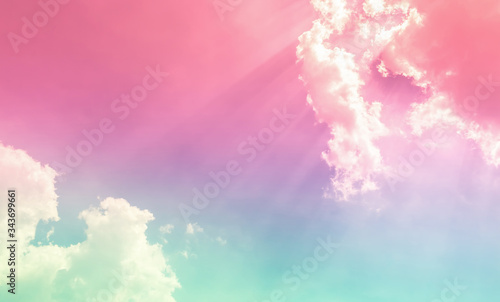 pink purple color and green blue in fantasy sky with bright clouds
