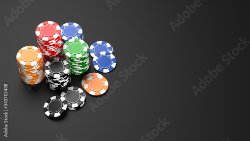 Stacks of colorful casino chips on black background. 3D illustration photo