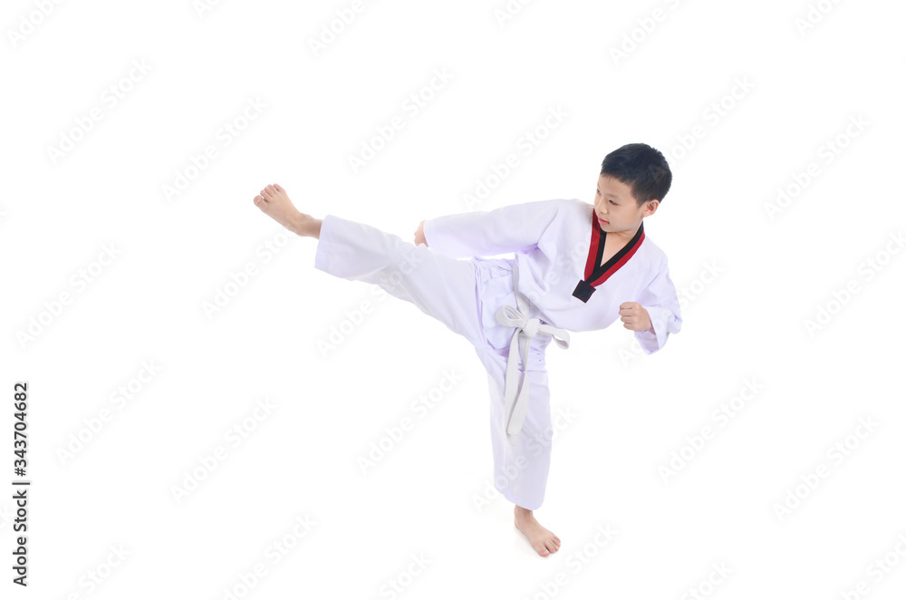 Obraz premium asian boy play Taegwondo on the white background