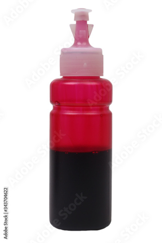 bottle of magenta ink for inkjet printer isolated on white background