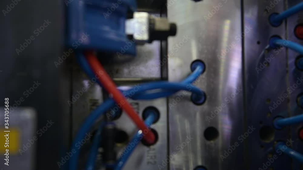 Automatic press for the production of plastic products. Automatic press for the production of plastic products.
