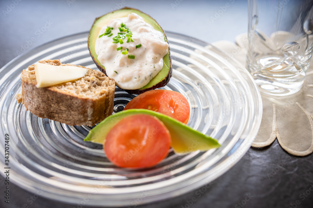 Vegetarian dish with tomato and avocado Vegetarian dish with tomato and avocado