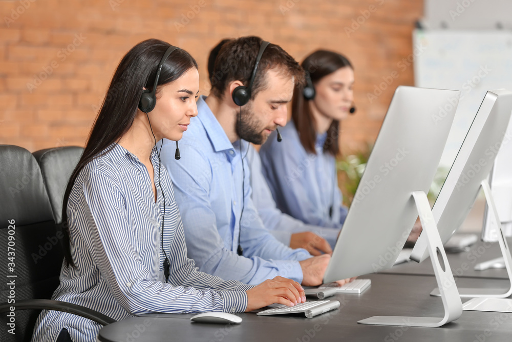 Team of technical support agents working in office Team of technical support agents working in office