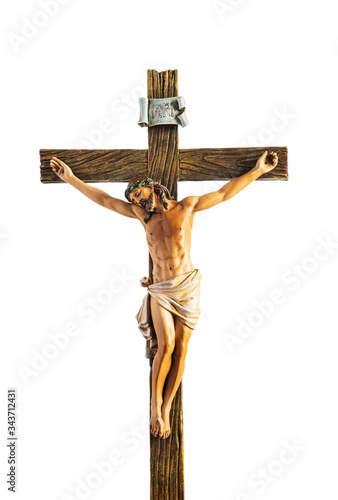 Canvas Print A small statue of Jesus Christ on the Cross isolated on white