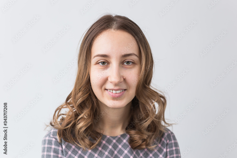 Face of a beautiful young girl with a clean fresh face close up. Face of a beautiful young girl with a clean fresh face close up.