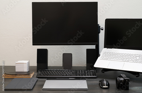 Editing workspace office. Photography equipment. Minimal black style. laptop and monitor. Graphics workstation. Smart work concept