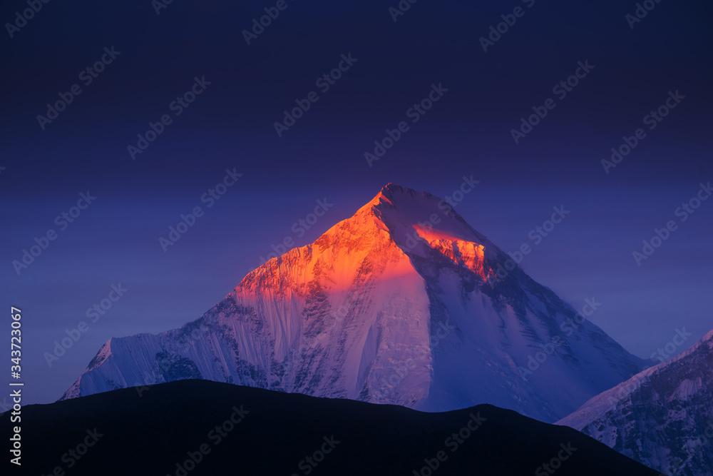 Sunrise on the top of mountain Dhaulagiri in Himalayas, Nepal