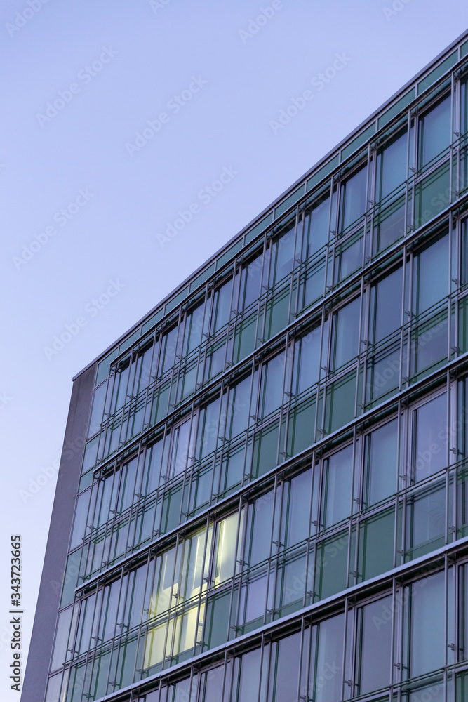 Facade of a Corporate Building during sunrise Facade of a Corporate Building during sunrise