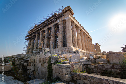 Side view of the facade of the Partenon in Athens surrounded by scaffolding during its reconstruction and rehabilitation works, Greece