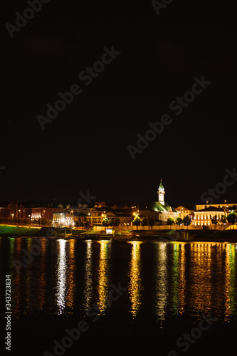 Russia. Kazan. August  2019. Summer. City center. Light from buildings is reflected in the water.