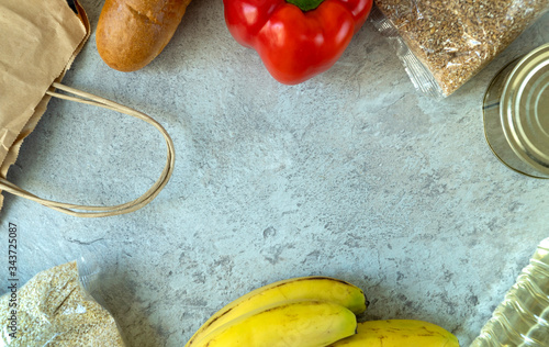 Flat lay composition with foodstuff. supply vital food items during the quarantine coronavirus Covid-19. free foodstuff provision for people in self-isolation. food donations. top view, copy space