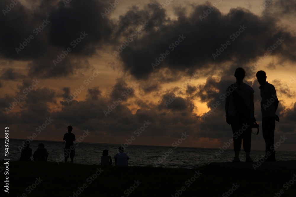 Old Dutch Fort, Galle, Sri Lanka - 06112018: Tourist enjoying the sunset time freedom in different asian country