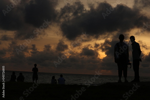 Old Dutch Fort, Galle, Sri Lanka - 06112018: Tourist enjoying the sunset time freedom in different asian country
