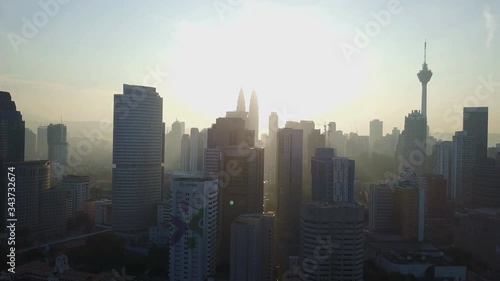 Wallpaper Mural Kuala Lumpur skyline aerial view at sunset with Petronas Towers and other skyscrapers. (Malaysia.) Torontodigital.ca