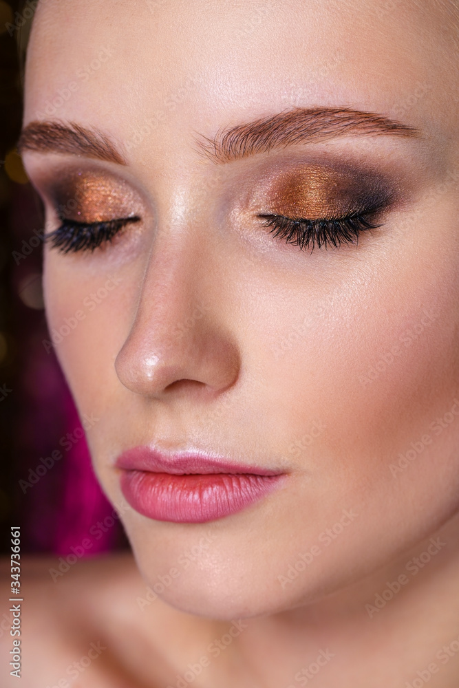 close-up portrait of attractive young model with bright make-up. close-up portrait of attractive young model with bright make-up.