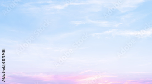 Sunset dramatic blue sky pink clouds background © jcsmilly