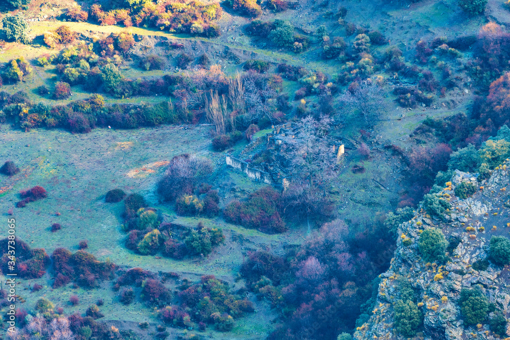 ruined farmhouse in the foothills of Sierra Nevada ruined farmhouse in the foothills of Sierra Nevada