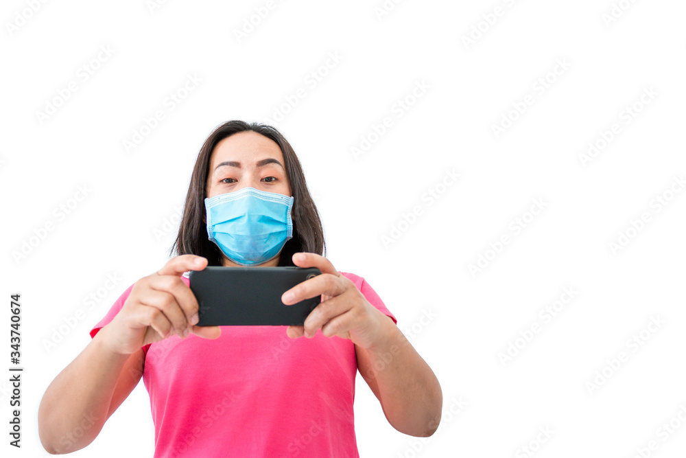 Corona virus (COVID-19), During detention at home Masked women use phones to make video calls to friends Corona virus (COVID-19), During detention at home Masked women use phones to make video calls to friends