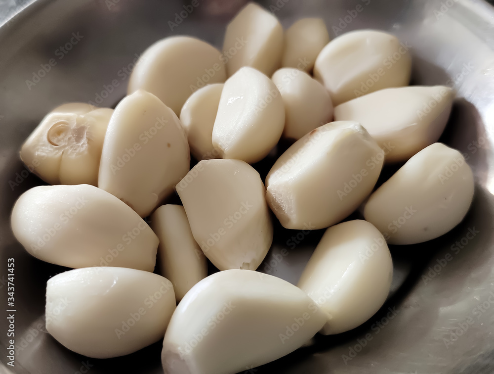 Garlic (Allium sativum), is used widely as a flavoring in cooking, but it has also been used as a medicine throughout ancient and modern history. Garlic (Allium sativum), is used widely as a flavoring in cooking, but it has also been used as a medicine throughout ancient and modern history.
