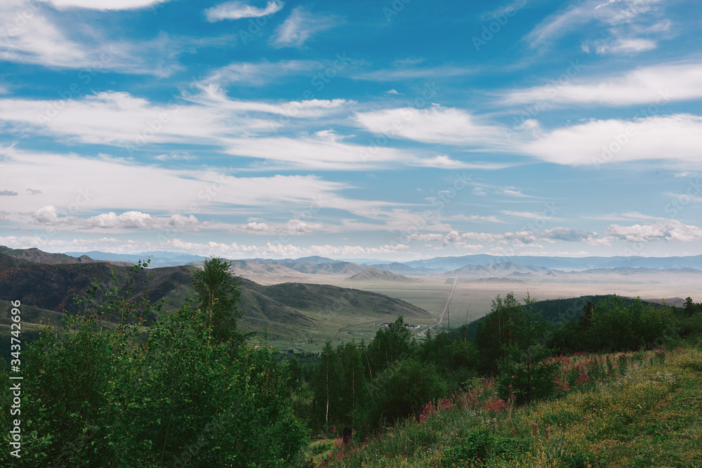 Fototapeta premium Mountains hill landscape with blue sky and clouds.