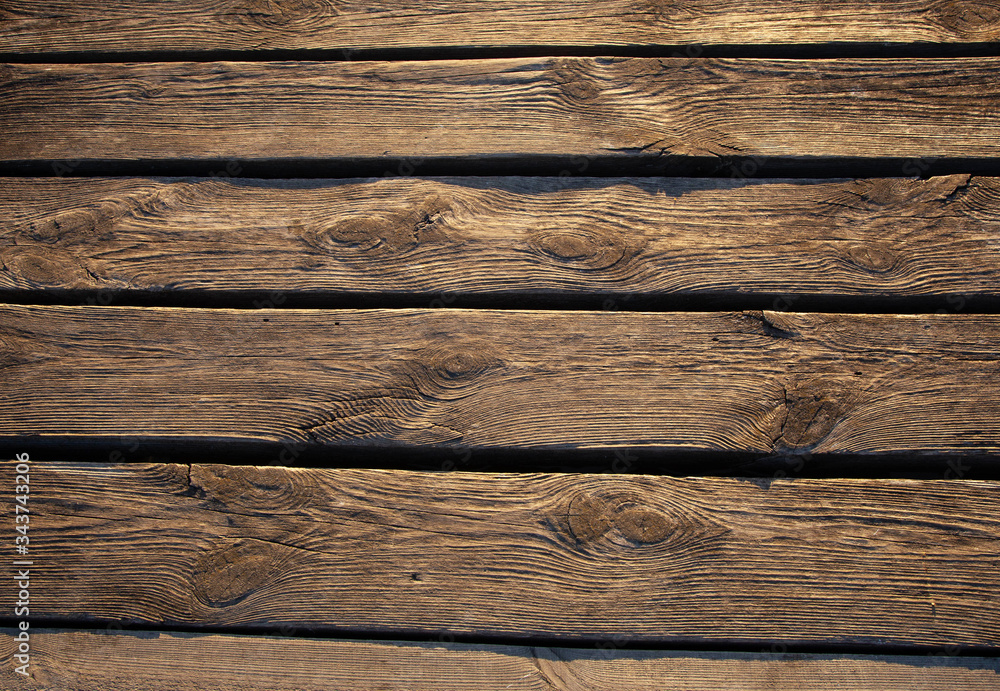 Obraz premium Wooden planks flooring, raft, wooden floor, pier, environmental material. The concept of using wood and ecological material in the interior.