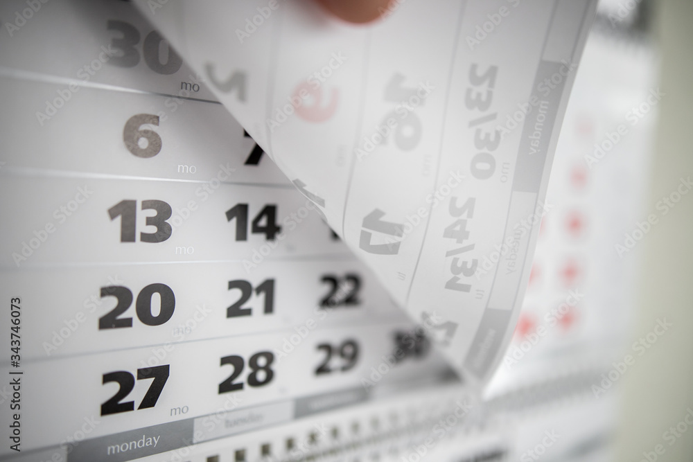 Months and dates shown on a calendar whilst turning the pages Months and dates shown on a calendar whilst turning the pages