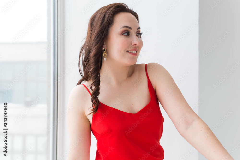 Close-up portrait of beautiful young woman with elegant hairstyle and luxurious jewelry and bijouterie. Close-up portrait of beautiful young woman with elegant hairstyle and luxurious jewelry and bijouterie.