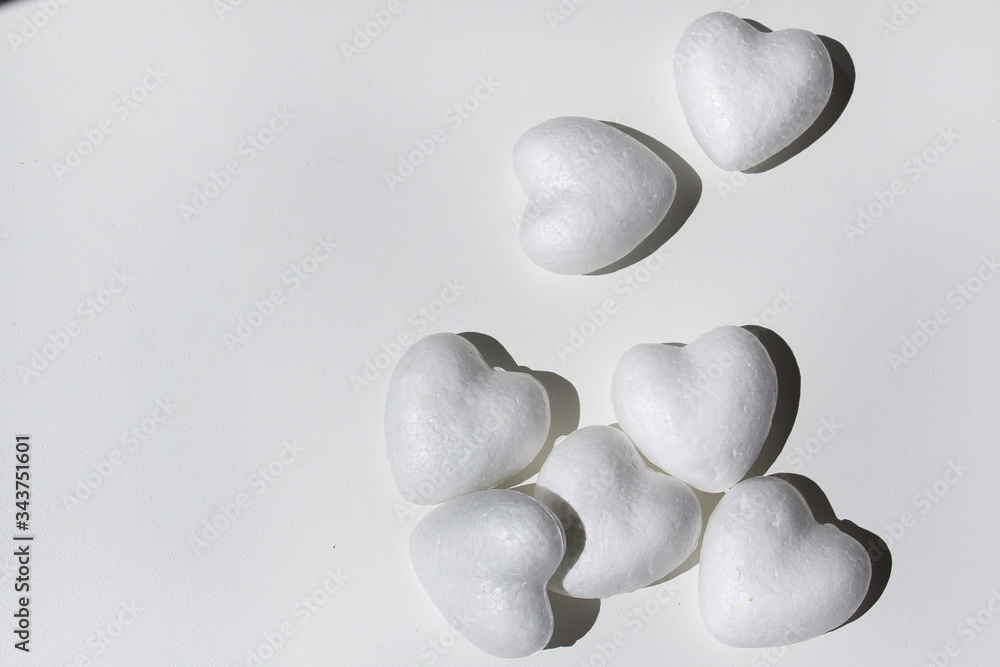 white hearts on white background community donation romance concept