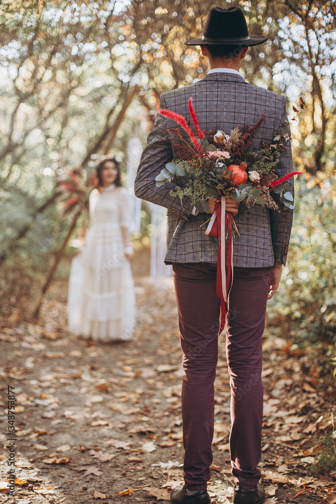 Amazing smiling wedding couple. Pretty bride and stylish groom. Perfect wedding background that conveys the mood of lovers and their love Amazing smiling wedding couple. Pretty bride and stylish groom. Perfect wedding background that conveys the mood of lovers and their love