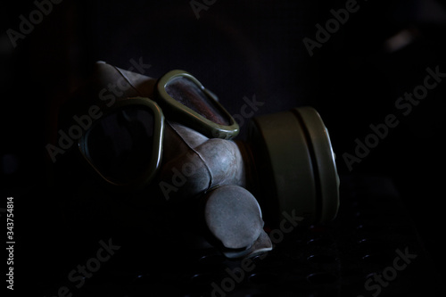 Wallpaper Mural Military Gas Mask in dark ambient. Coronavirus, Covid19 pandemic prevention. Toxic, biohazard and infection danger. Apocalyptic concept Torontodigital.ca