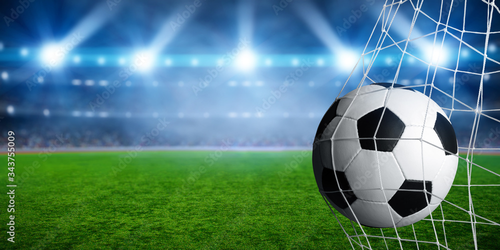 Fototapeta premium Soccer ball goal concept on stadium