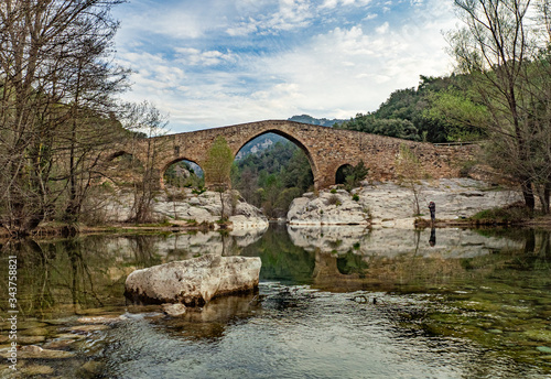 Mediaval bridge of Pedret (Catalonia) and the Llobregat river. photo