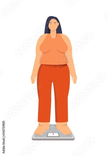 Woman obese on the scales. The concept of extra pounds, overeating, health problems, obesity. Poor nutrition, metabolic disorders.