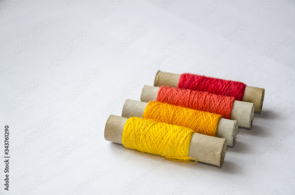 A palette of red threads from four balls. A palette of red threads from four balls.