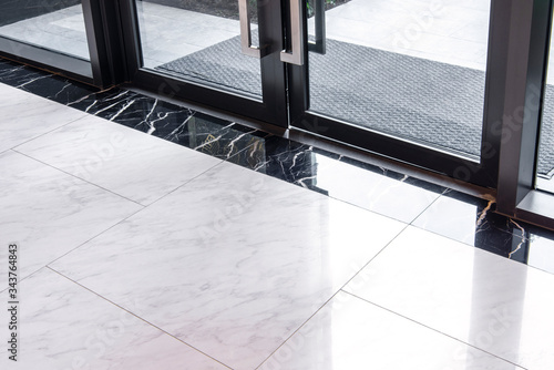 Marble floor tiles in the glass door..